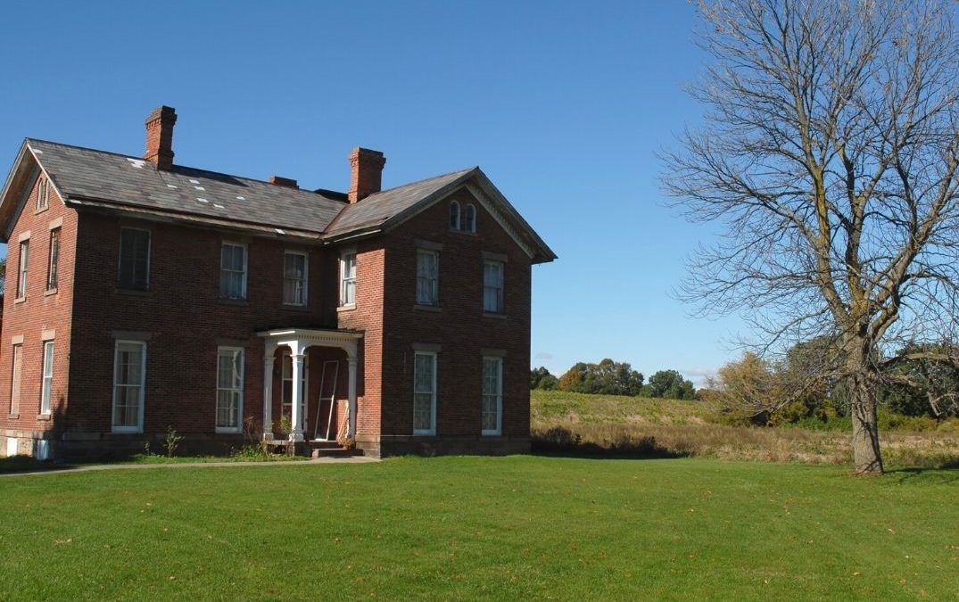 Large brick home on bare land