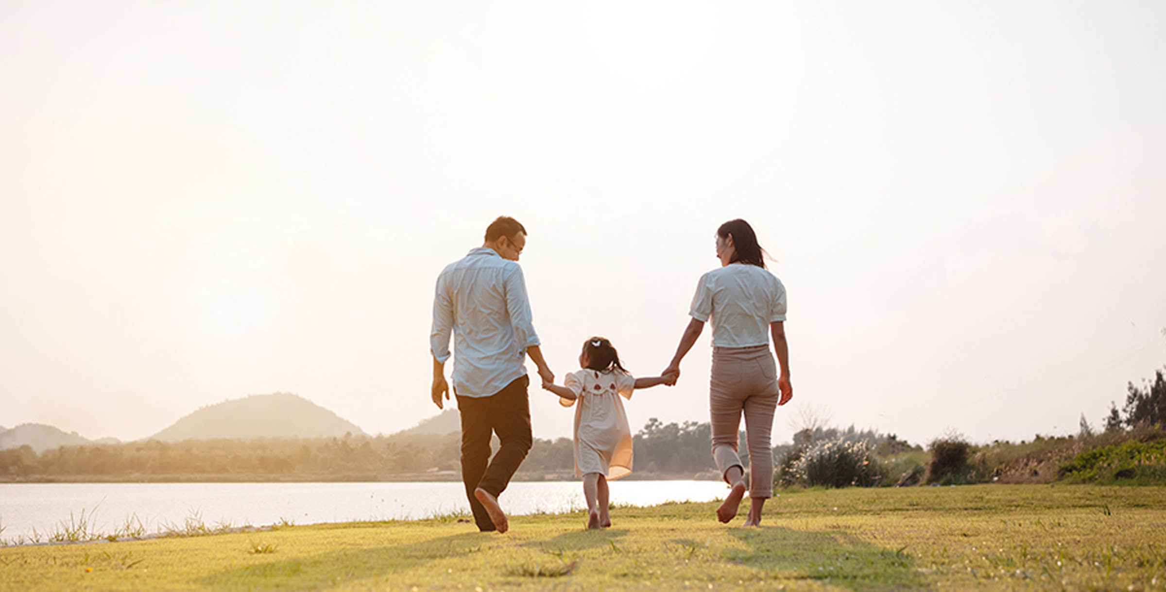 Romantic Couple Driving on Beautiful Road at Sunset
